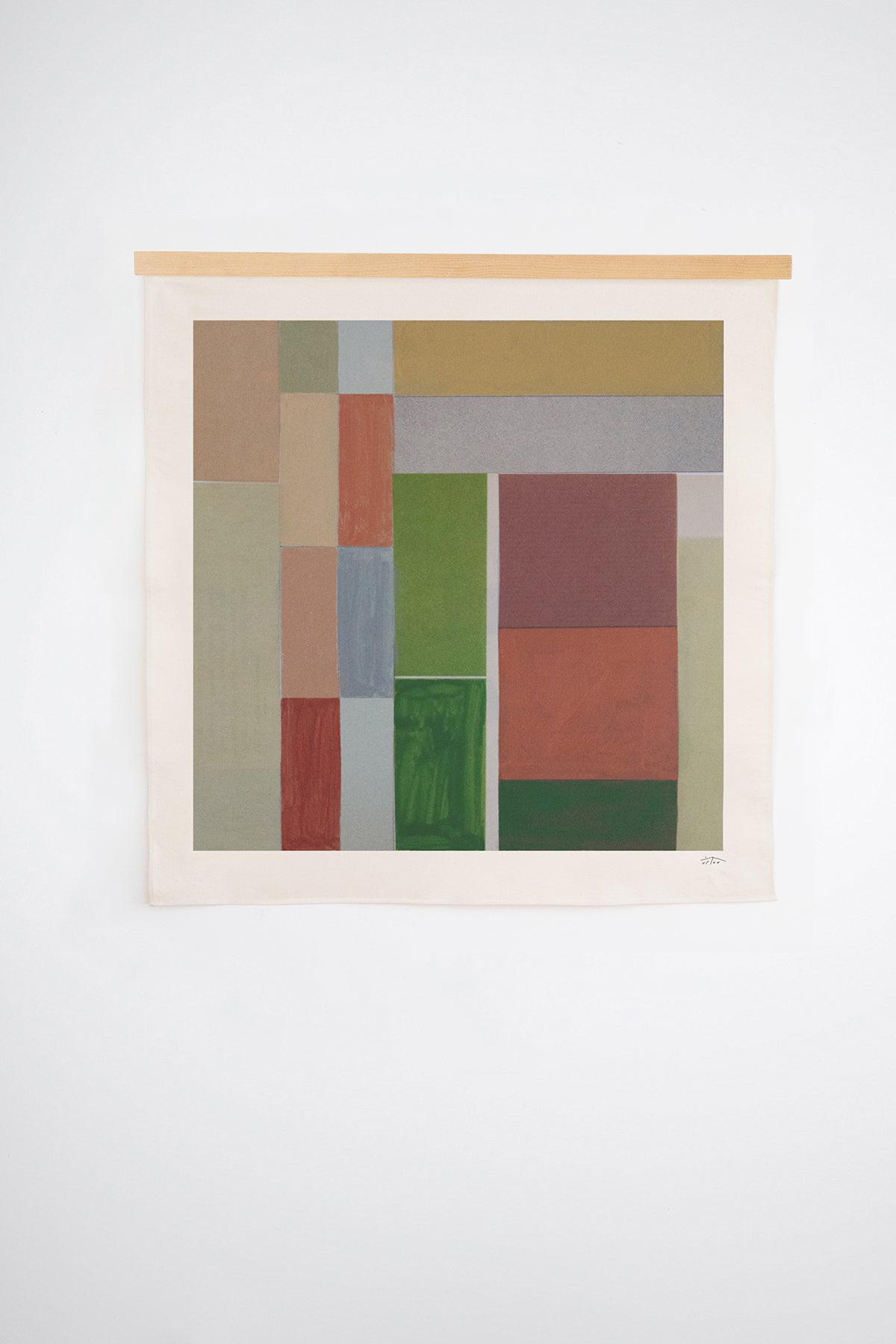 The Mata is an original art print on 100% cotton canvas from Michael Upton. Featuring an architectural abstract design in earth tones, the Mata is a large format modern wall hanging. Shown here on a white background with a wood hanging bar.