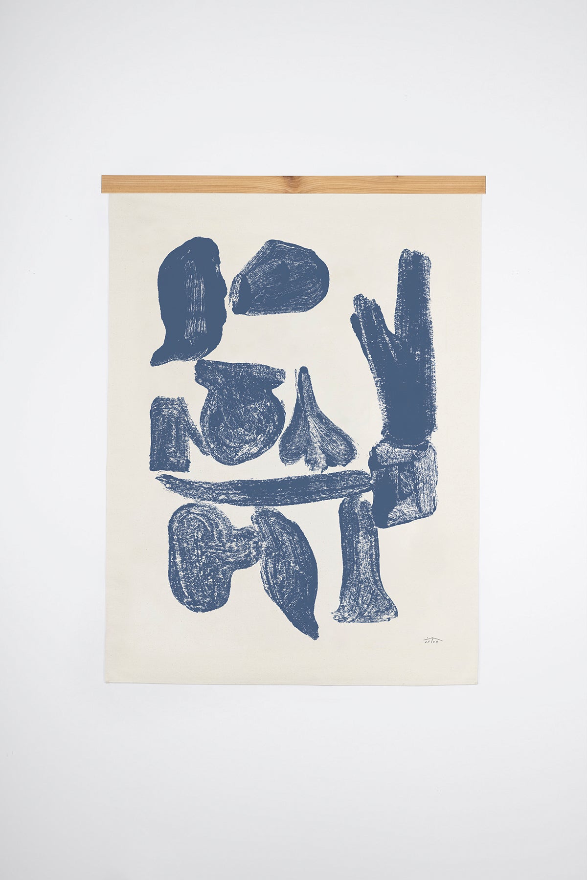 The Pallas is an original art print on 100% cotton canvas from Michael Upton. Featuring bold abstract organic shapes in a dark blue hue, the Pallas is a large format modern wall hanging. Shown here with a wood hanging bar on a white background.