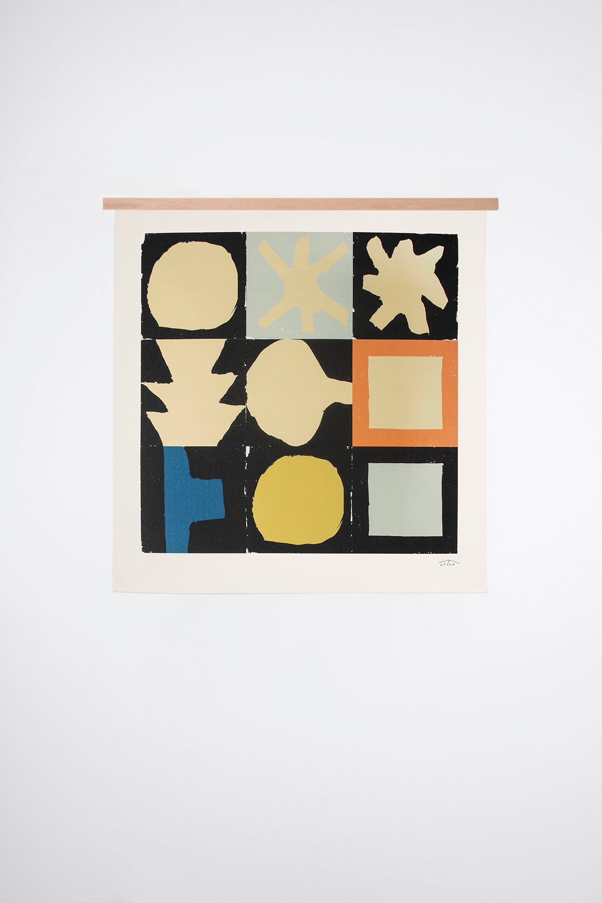 The Tenby is an original art print on 100% cotton canvas from Michael Upton. Featuring a geometric abstract mosaic design with bold colorful shapes, the Tenby is a large format modern wall hanging. Shown here with a wood hanging bar on a white background.