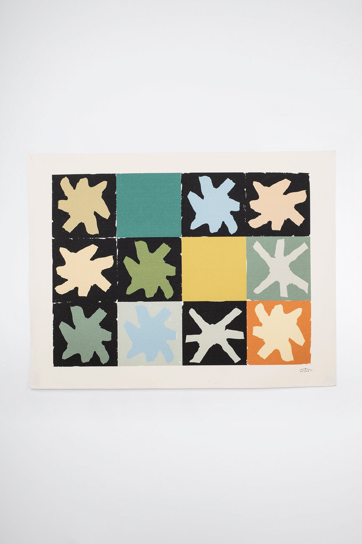 The Asterism is an original art print on 100% cotton canvas from Michael Upton. Featuring a geometric abstract mosaic design with bold colorful shapes, the Asterism is a large format modern wall hanging. Shown here on a white background.