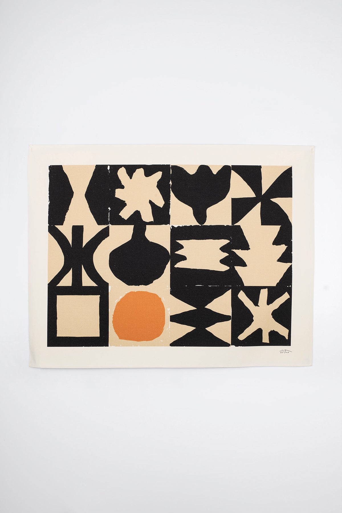 The Bedwa is an original art print on 100% cotton canvas from Michael Upton. Featuring a geometric abstract mosaic design with bold shapes, the Bedwa is a large format modern wall hanging. Shown here on a white background.