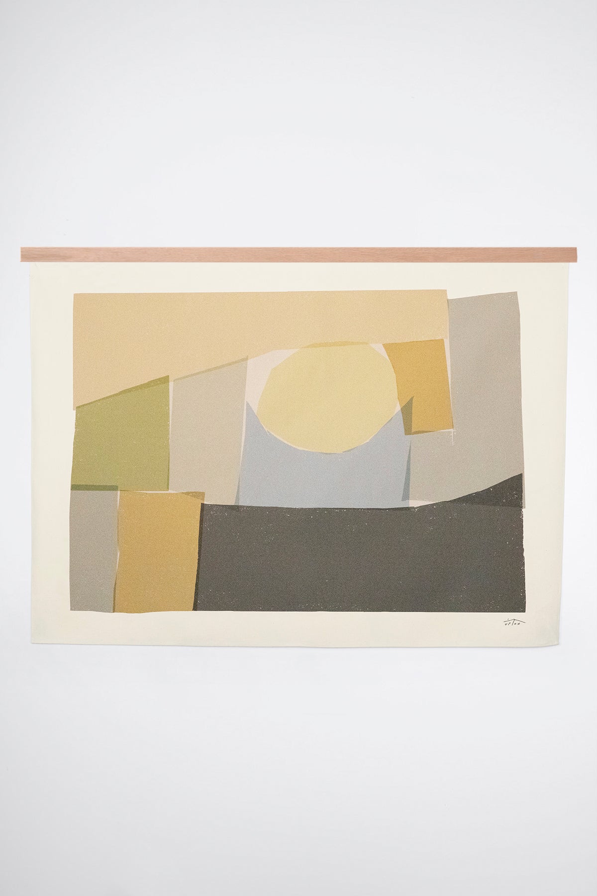 The Burren is an original art print on 100% cotton canvas from Michael Upton. Featuring an abstract block print composition in muted colors, the Burren is a large format modern wall hanging. Shown here with a wood hanging bar on a white background.