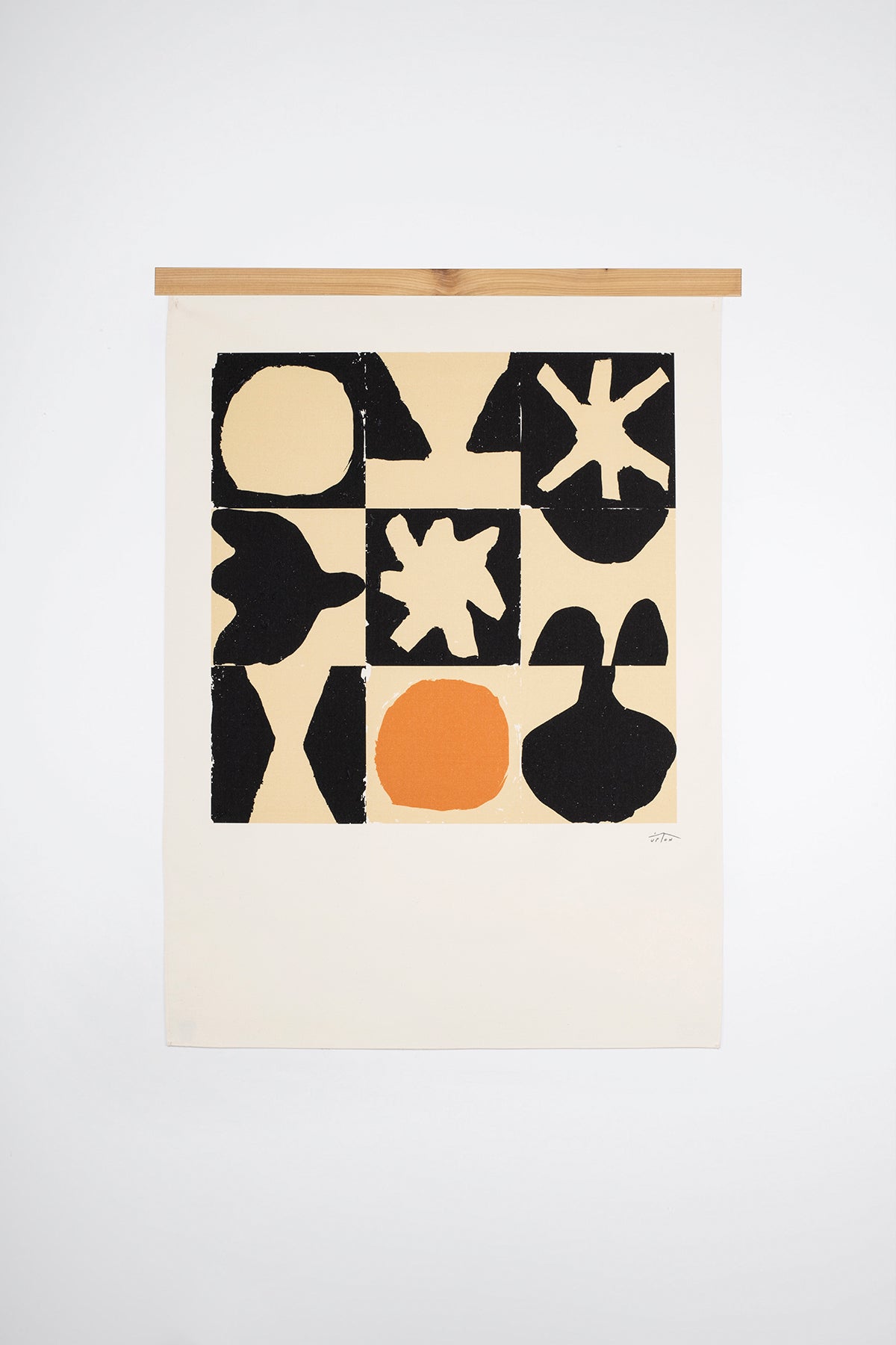 The Hersham is an original art print on 100% cotton canvas from Michael Upton. Featuring a geometric abstract mosaic design with bold shapes, the Hersham is a large format modern wall hanging. Shown here with a wood hanging bar on a white background.