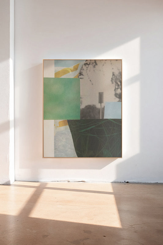 Durrow, a custom framed art print on 100% cotton canvas. Large geometric abstract collage with vivd greens and light blues in a gallery setting.