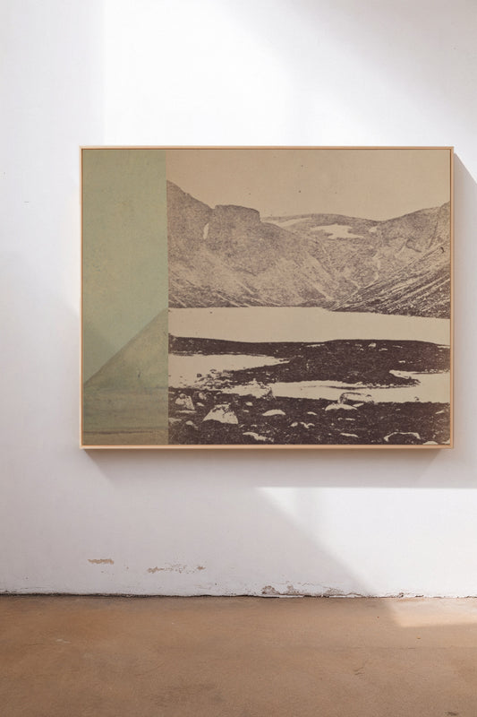 Loch A'an, a custom framed art print on 100% cotton canvas. Large modern geometric mountain landscape photo collage in cream with large block of muted sage green in a gallery setting.