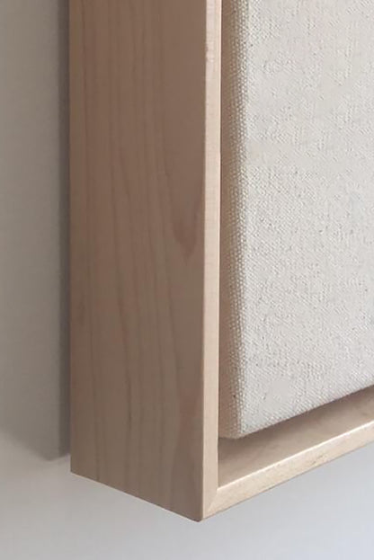 Detail of custom wood float frame on a custom framed large art print on 100% cotton canvas.